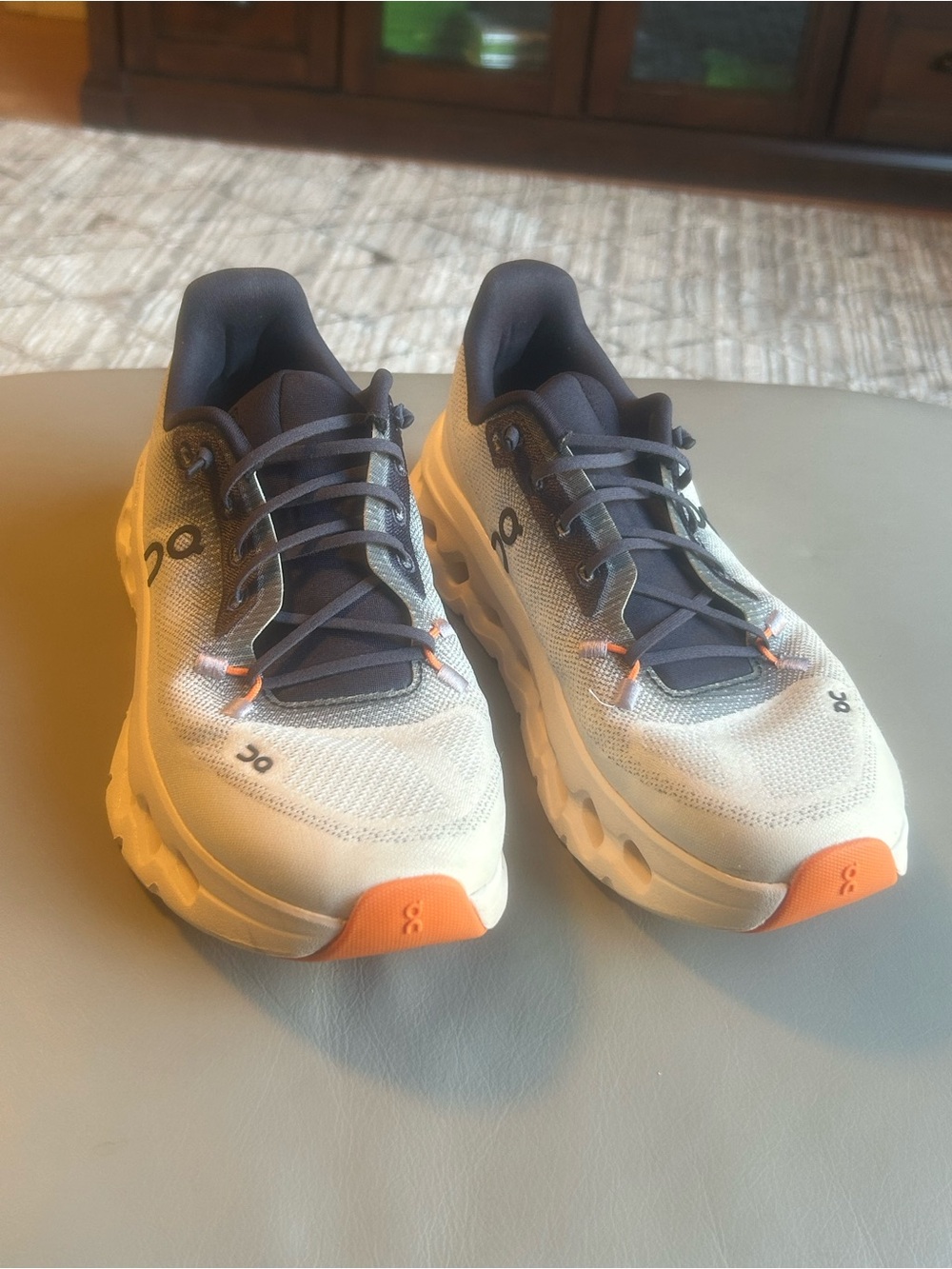On Running women’s Athletic Shoes in White, Gray and Orange